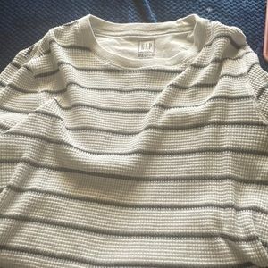 A grey men gaps long sleeve shirt. Never worn